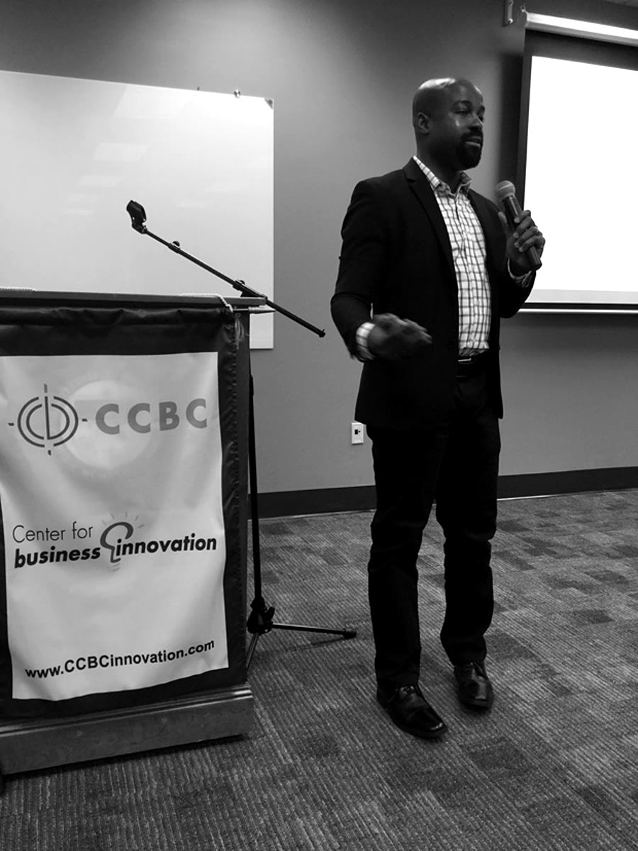 Kwame Kuadey speaking at the Center for Business Innovation